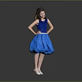 Woman In Blue Sleeveless Dress With Fluffy Skirt And White Shoes Posing In Gray Background