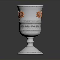 Silver Decorative Cup Featuring Red Floral Ornaments On Elegant Base For Home Decor