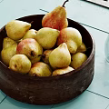 Ceramic Bowl Filled With Fresh Pears And Glass Bottle On Light Blue Tiled Floor
