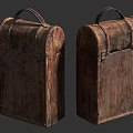 Vintage Brown Wooden Trunk With Worn Texture Leather Handle And Metal Clasps