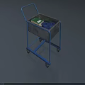 Blue Industrial Metal Cart With Green Book And Blue Rings In Basket On Wheels