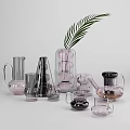 Modern Glass Tableware Set With Various Shapes Pink Black Transparent Pieces And Palm Leaf Decor