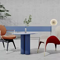 Modern Blue Round Table and Chair Set with Orange Armchair White Red Chair Green Plant