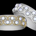 Elegant Silver And Gold Rings With Intricate Braided Design And Sparkling Gemstones