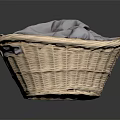 Wicker Storage Basket Containing Soft Gray Cloth For Daily Household Items