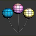 Blue Pink Yellow Disco Balls With Reflective Surface Connected By White Strings On Dark Background