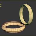 Two Elegant Gold Bracelets With Hammered Textured Surface And Shiny Metallic Look