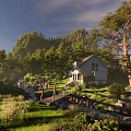 Sunlit Scenic White House in Woods with Stream Wooden Bridge Grass and Wildflowers Green Hills