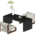 Black Tea Table and Chairs with Wood Frame Light Gray Cushions White Vase Green Plant Black Teapot