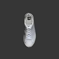 White Casual Sneakers With Classic Lace Up Design And Clean Minimalist Look