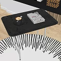 Sleek Black Side Table With Metal Legs Coffee Cup And Magazine On Striped Rug