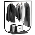 Clothes on Modern Clothes Rack with Striped Blazer Gray Coat White Top and Shopping Bags