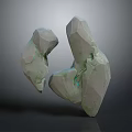 Two Natural Stone Pieces With Wood Like Texture And Green Veins On Rough Surface