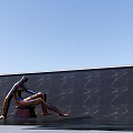 Sitting Human Sculpture by Black Wall with Water Grass and Blue Sky