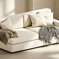 Modern Cream White Fabric Two Seater Sofa With Soft Pillows And Cozy Throw Blankets