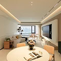 Modern Living and Dining Room Interior With White Sofa Black Coffee Table and Dining Chairs