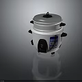 White Electric Rice Cooker With Silver Lid And Black Handles For Household Use