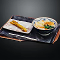 Delicious Ramen Bowl With Green Vegetables And Tempura On Black Tray