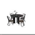 Modern Round Black Dining Table Set with Beige Cushioned Chairs and White Vase 3d model