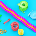 Colorful Playground Equipment with Slides Curved Tubes Rings and Bright Components