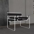 Modern Leisure Chair With White Metal Frame Black Cushion And Armrest In Minimalist Interior