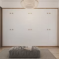 Modern White Wardrobe with Cabinet Doors in Bedroom with Wooden Floor and Padded Bench