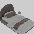 Modern Light Gray Single Bed With Curved Upholstered Headboard Pillows And Striped Quilt