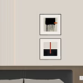 Abstract Paintings Framed Hanging On Light Wall With Black White Red Colors