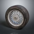 Automotive Tire with Wheel Rim Detailed Spoke Design and Tread Pattern on Gray Background