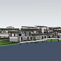 Modern Waterfront Guesthouse Buildings With Wooden Decks Overlooking Water And Green Lawn