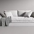Modern Light And Brown Multi Seater Sofa With Pillows And Throw Blanket 3d model