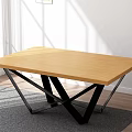 Modern Coffee Table With Wooden Top And Black Metal Crossed Legs In Bright Room