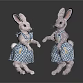 Adorable Stuffed Rabbit Dolls Wearing Blue And White Checkered Dresses Standing On Black Reflective Surface