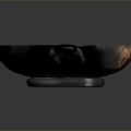 Metal Dish With Two Handles And Central Carved Sculpture Design