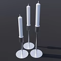 Three White Candles on White Candle Holders Against Black Background 3d model