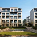 Modern Multi Story Townhouses With Large Glass Windows Greenery And Sunset Pathway