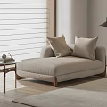 Modern Beige Plush Chaise Lounge Interior With Throw Pillows Side Table And Floor Lamp