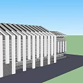 Modern Building Exterior With Angled White Roof Structures Gray Brick Walls And White Support Columns