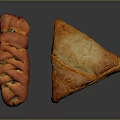Freshly Baked Braided Bread And Triangular Flaky Pastry On