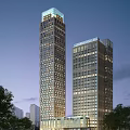 Two Modern Tall Office Towers With Glass Curtain Walls And Evening Lighting