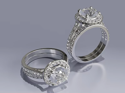 Elegant Diamond Rings With Round Center Stones And Intricate Metal Band Design 3d model