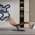 Tan Modern Lounge Chair In Contemporary Interior With Abstract Art And Green Plant