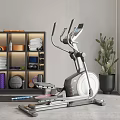 Home Fitness Equipment Setup With Elliptical Trainer Dumbbells Yoga Ball And Potted Plant