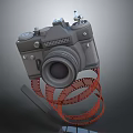 Vintage Digital Camera With Red Film Roll And Classic Lens Design