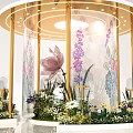 Modern Floral Display With Circular Golden Frame Ceiling Light Green Plants And White Base