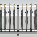 Sturdy Black Umbrellas Neatly Hung On Metal Rack For Household Use