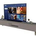 Modern Gray TV Stand With Flat Screen TV And Decorative Figurines In Living Room Setup