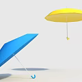 Two Open Blue And Yellow Umbrellas Showing Shadows On Light Colored Background