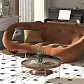 Modern Curved Brown Sofa And Round Coffee Table Set With Decorative Pillows Plants And Books