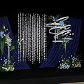 Banquet Hall Decorated With Navy Blue Curtains Crystal Drapes And Floral Arrangements